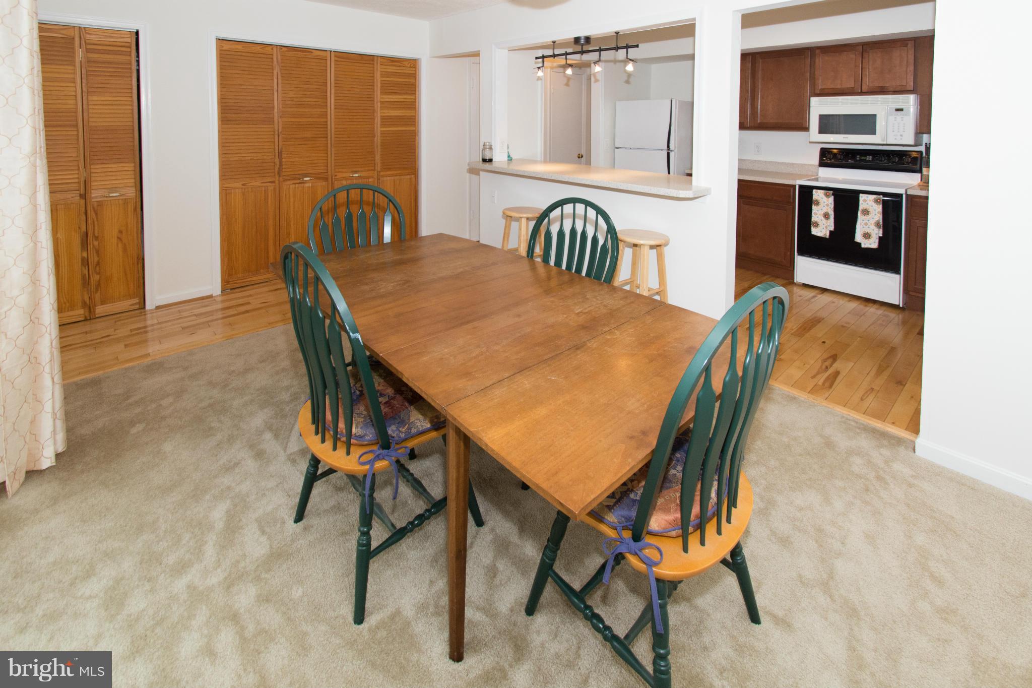 110 Oakwood Road Edgewater, MD 21037 - Photo 8 of 23 a view of a dining room with furniture