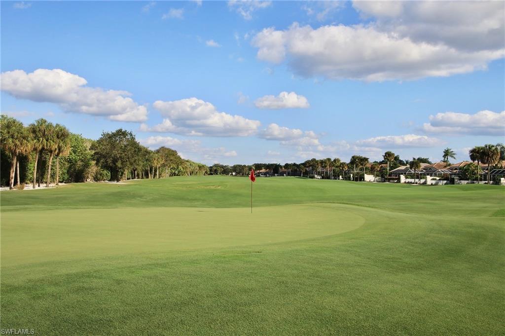 211 Via Napoli Naples, FL 34105 - Photo 14 of 23 a view of an ocean and a houses