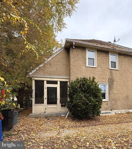 a backyard of a house with garden