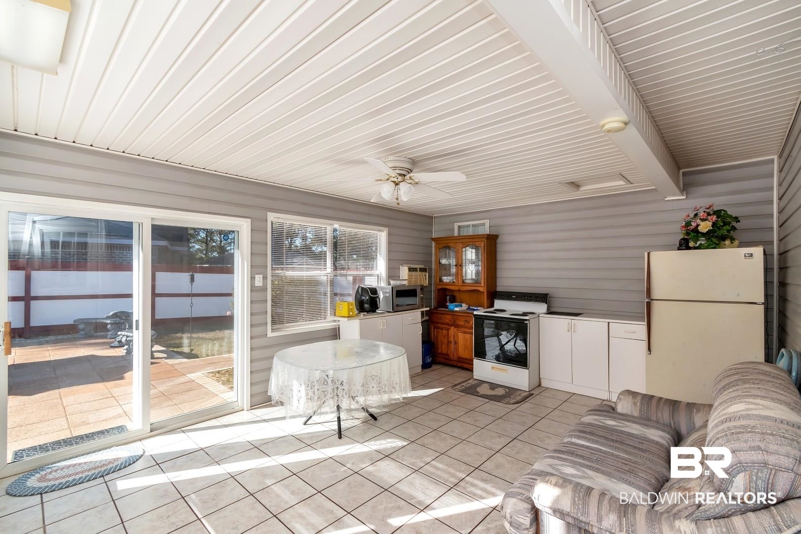 8221 Woodbend Drive Semmes, AL 36575 - Photo 27 of 35 Sunroom / solarium featuring ceiling fan and beamed ceiling