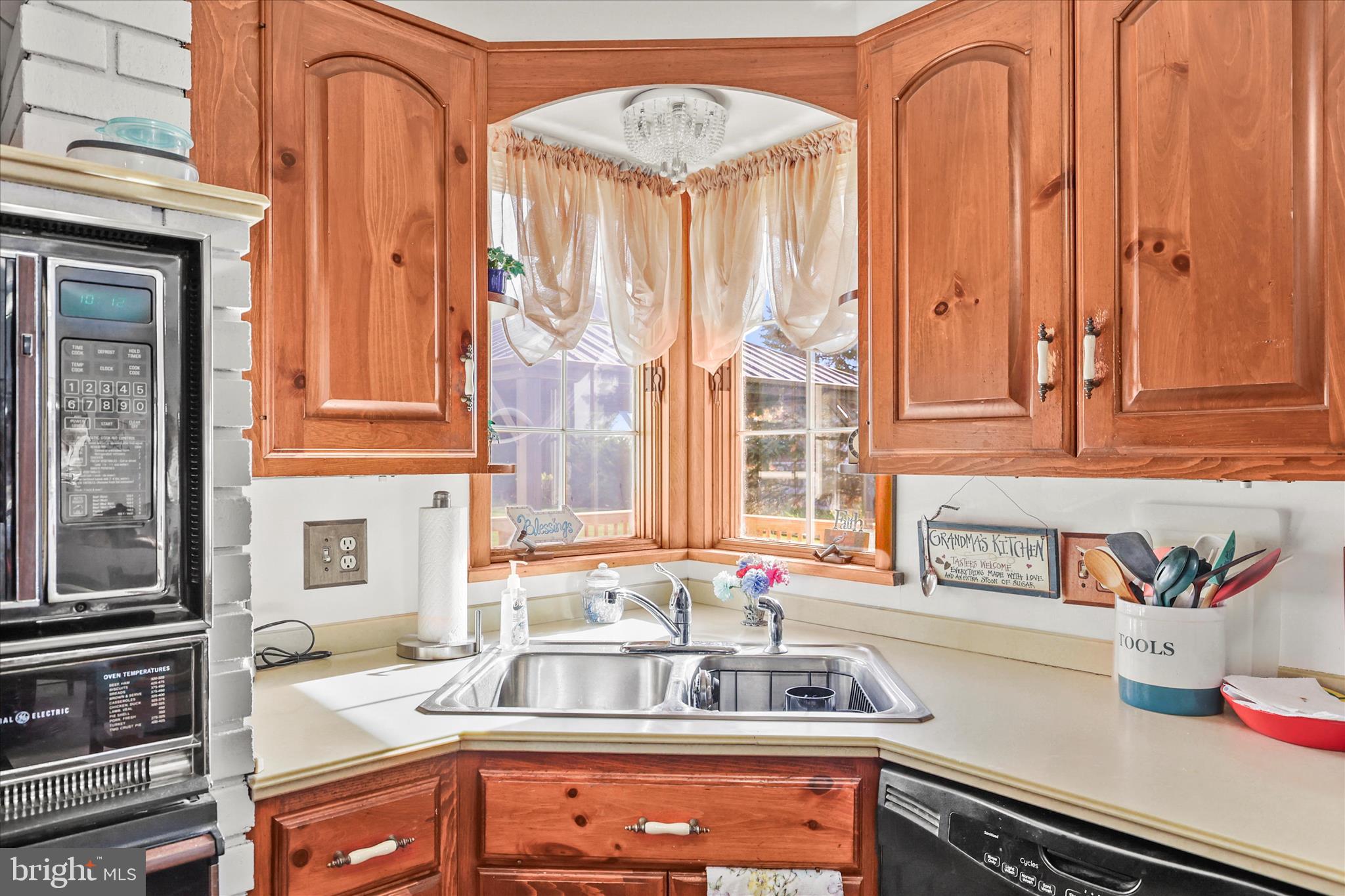 4050 Grandview Road Hanover, PA 17331 - Photo 14 of 47 a kitchen with stainless steel appliances a sink a counter and a window