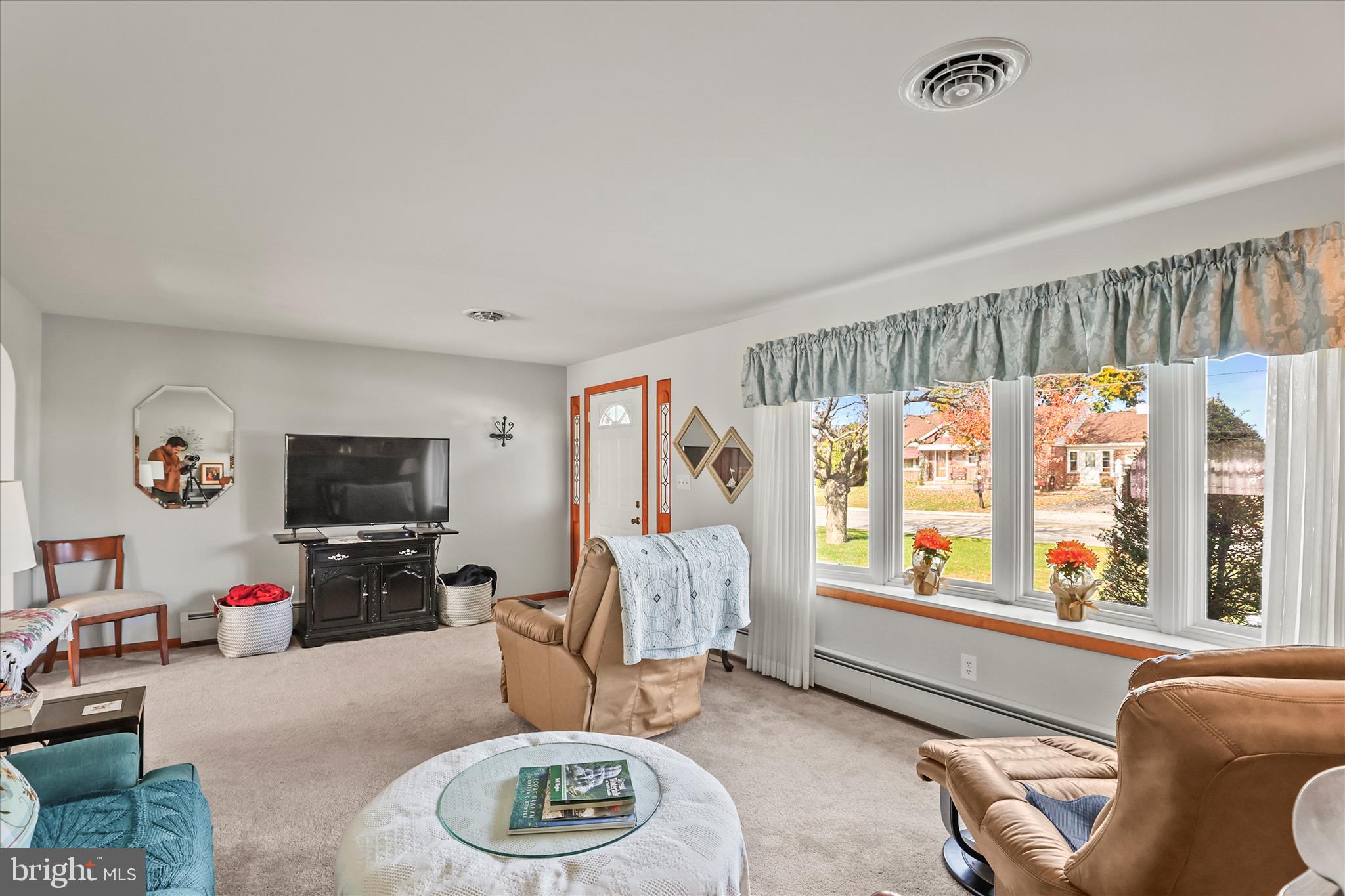 4050 Grandview Road Hanover, PA 17331 - Photo 7 of 47 a living room with furniture and a flat screen tv