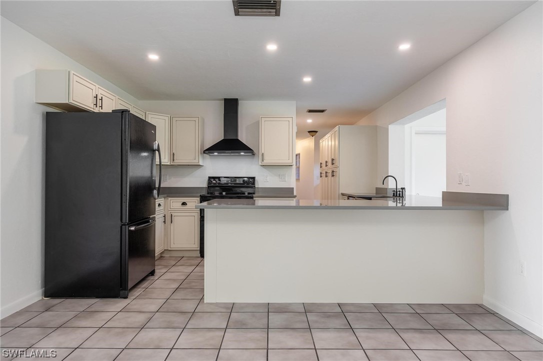 1850 Fort Denaud Road LaBelle, FL 33935 - Photo 11 of 37 a kitchen with stainless steel appliances a refrigerator and a sink