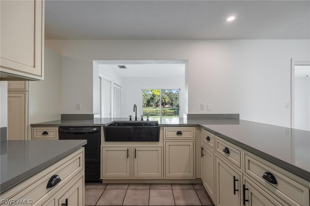 1850 Fort Denaud Road LaBelle, FL 33935 - Photo 12 of 37 a kitchen with a sink and cabinets
