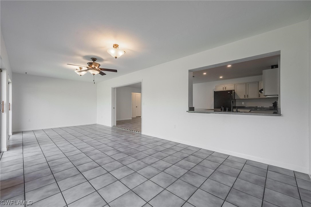 1850 Fort Denaud Road LaBelle, FL 33935 - Photo 17 of 37 a view of an empty room and kitchen view