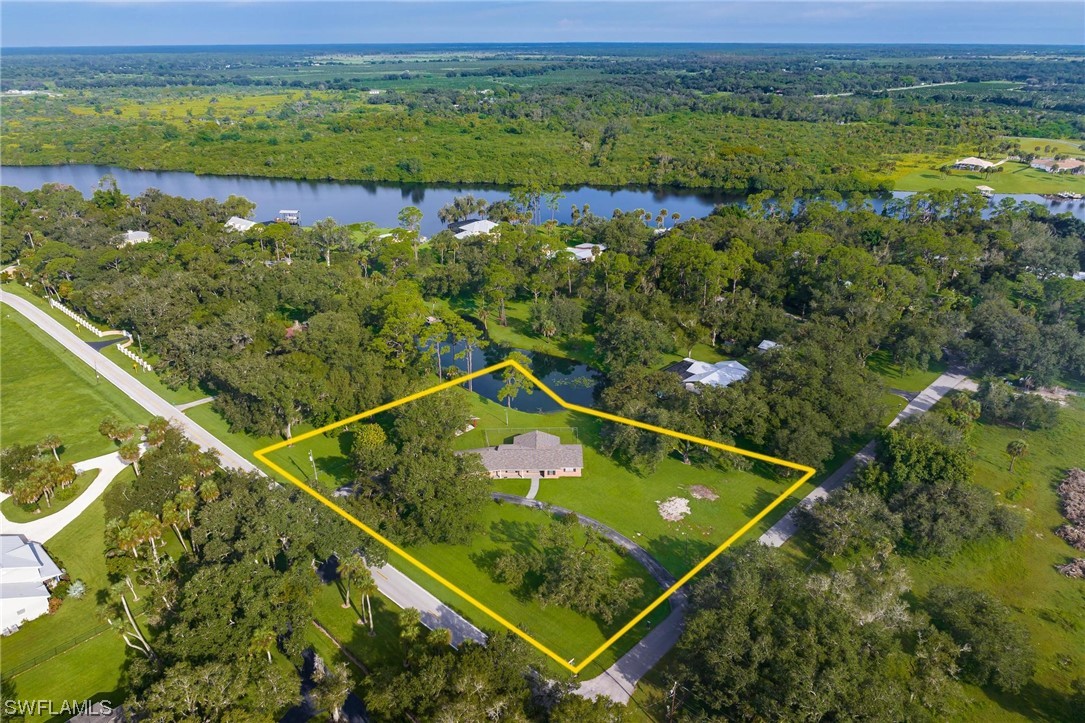 1850 Fort Denaud Road LaBelle, FL 33935 - Photo 2 of 37 a view of a tennis court