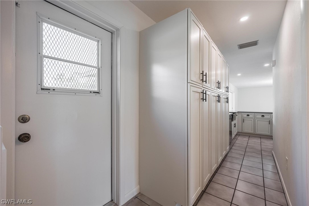 1850 Fort Denaud Road LaBelle, FL 33935 - Photo 25 of 37 a view of a hallway with a white walls