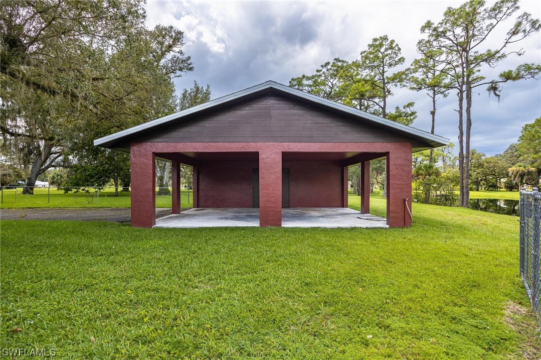 1850 Fort Denaud Road LaBelle, FL 33935 - Photo 30 of 37 a view of a house with garden