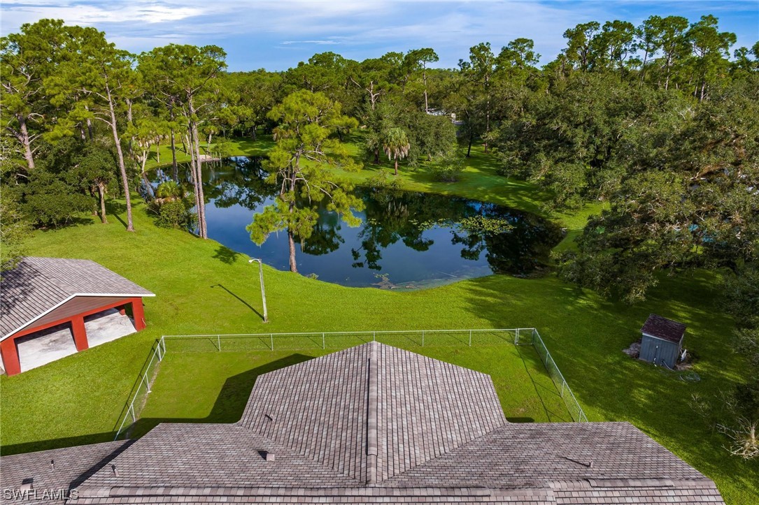 1850 Fort Denaud Road LaBelle, FL 33935 - Photo 35 of 37 a green field with trees in the background