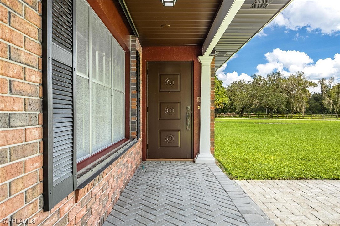 1850 Fort Denaud Road LaBelle, FL 33935 - Photo 5 of 37 a view of a porch