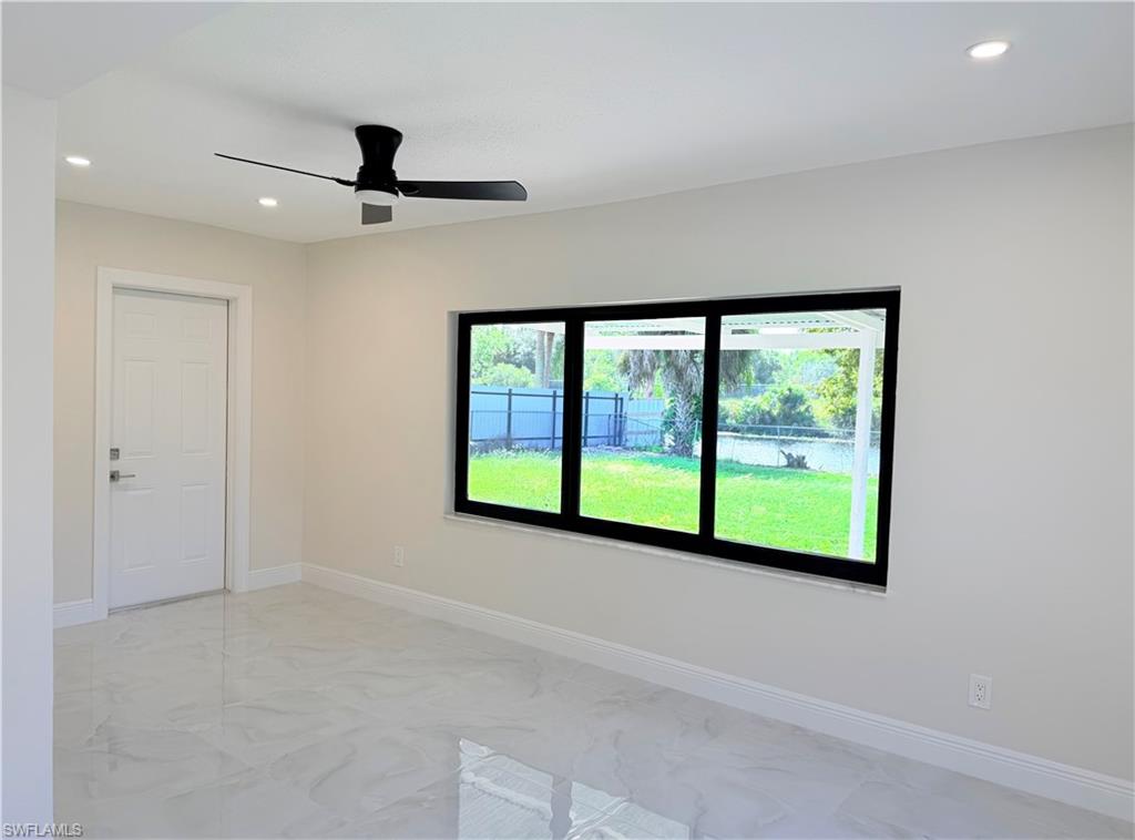 4212 32nd Avenue Southwest Naples, FL 34116 - Photo 14 of 27 a view of a room with a large window