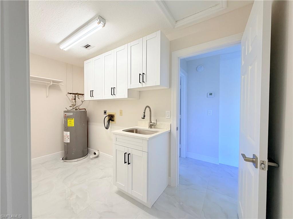 4212 32nd Avenue Southwest Naples, FL 34116 - Photo 16 of 27 a view of storage and utility