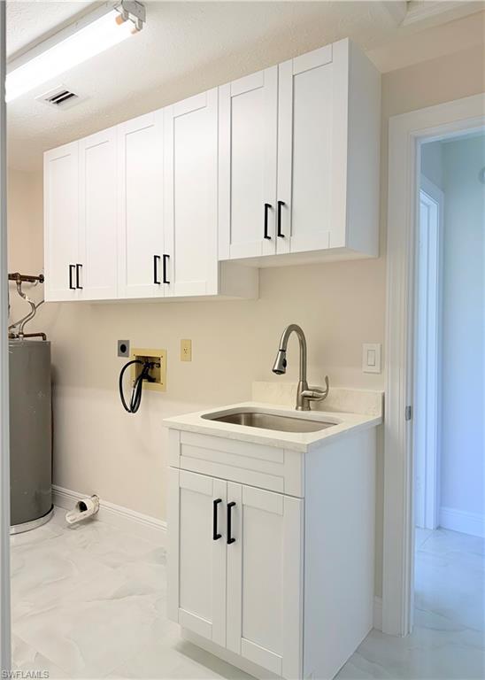 4212 32nd Avenue Southwest Naples, FL 34116 - Photo 17 of 27 a view of kitchen with sink and cabinets
