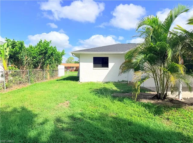 a view of a backyard with a plants