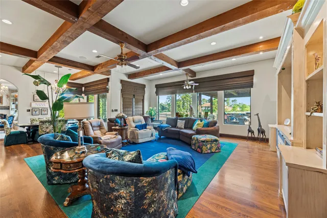 a kitchen with a sink a stove and a microwave