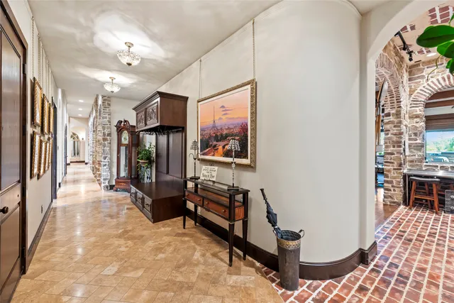 a spacious bathroom with a sink double vanity granite and shower
