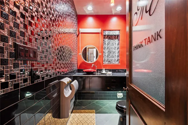 a view of a house with swimming pool and sitting area