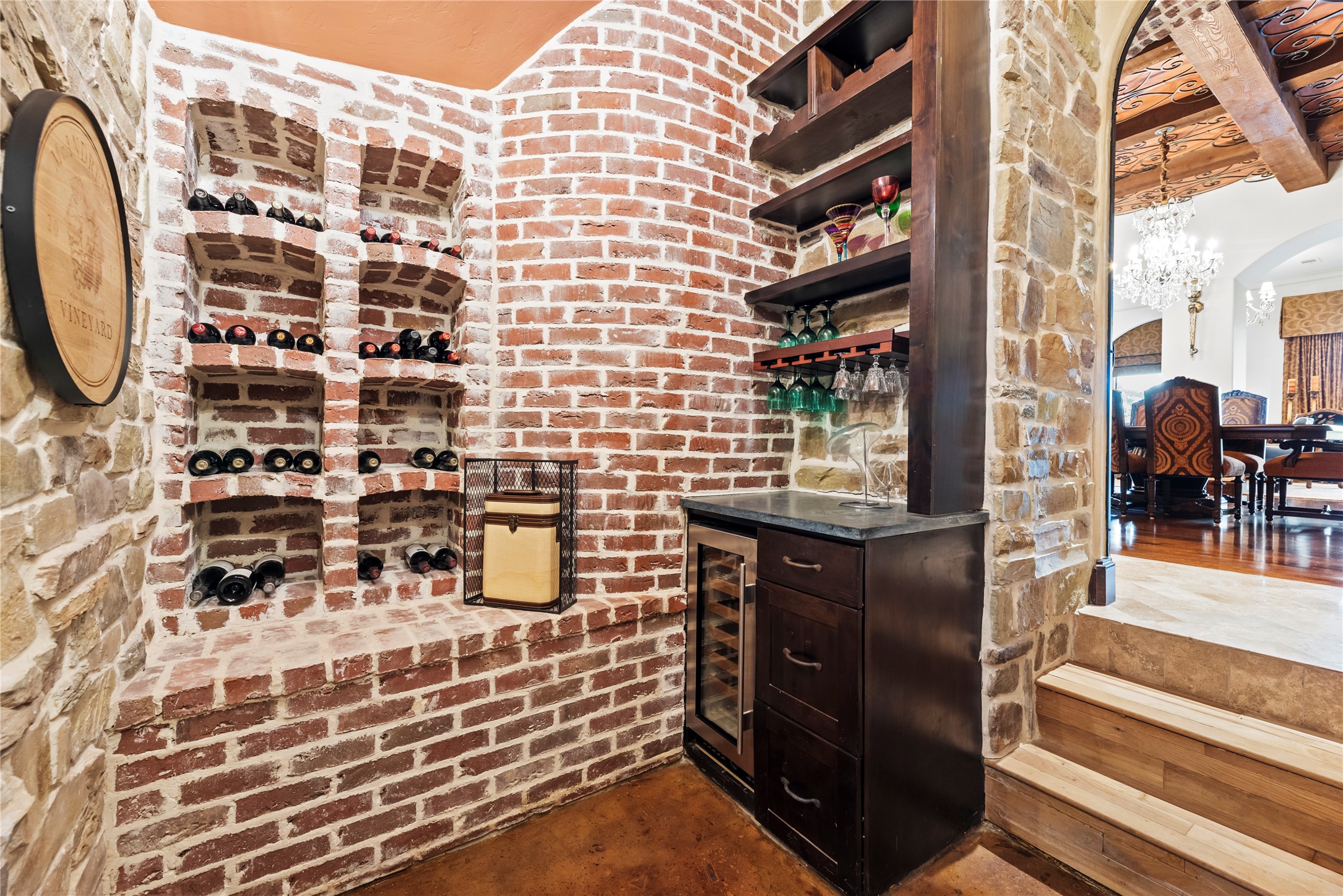 7715 Firethorne Creek Court Spring, TX 77389 - Photo 43 of 50 Discover the elegant wine room, featuring a wine refrigerator and ample storage.