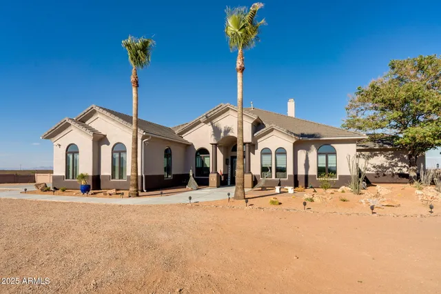 a front view of a house with a view of the house