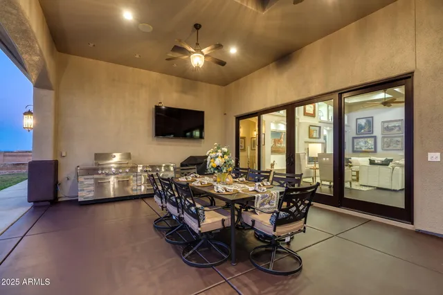 a view of a dining room with furniture window and outside view
