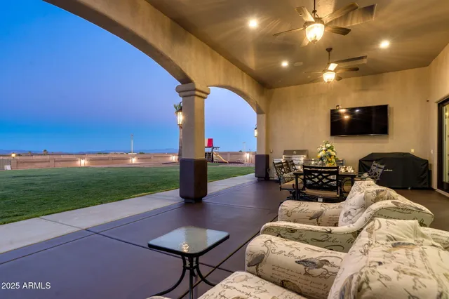 a outdoor living space with furniture and a garden