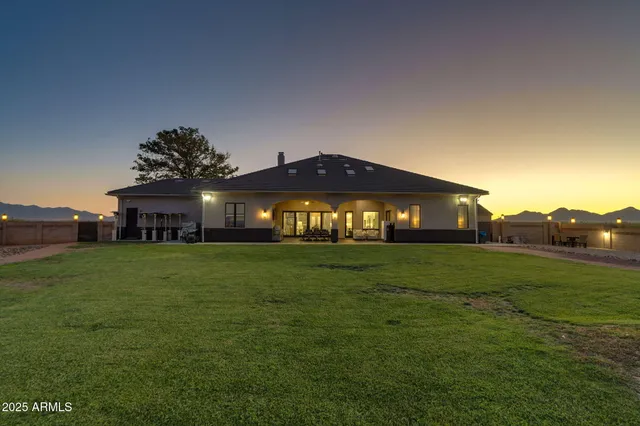a front view of house with yard and seating