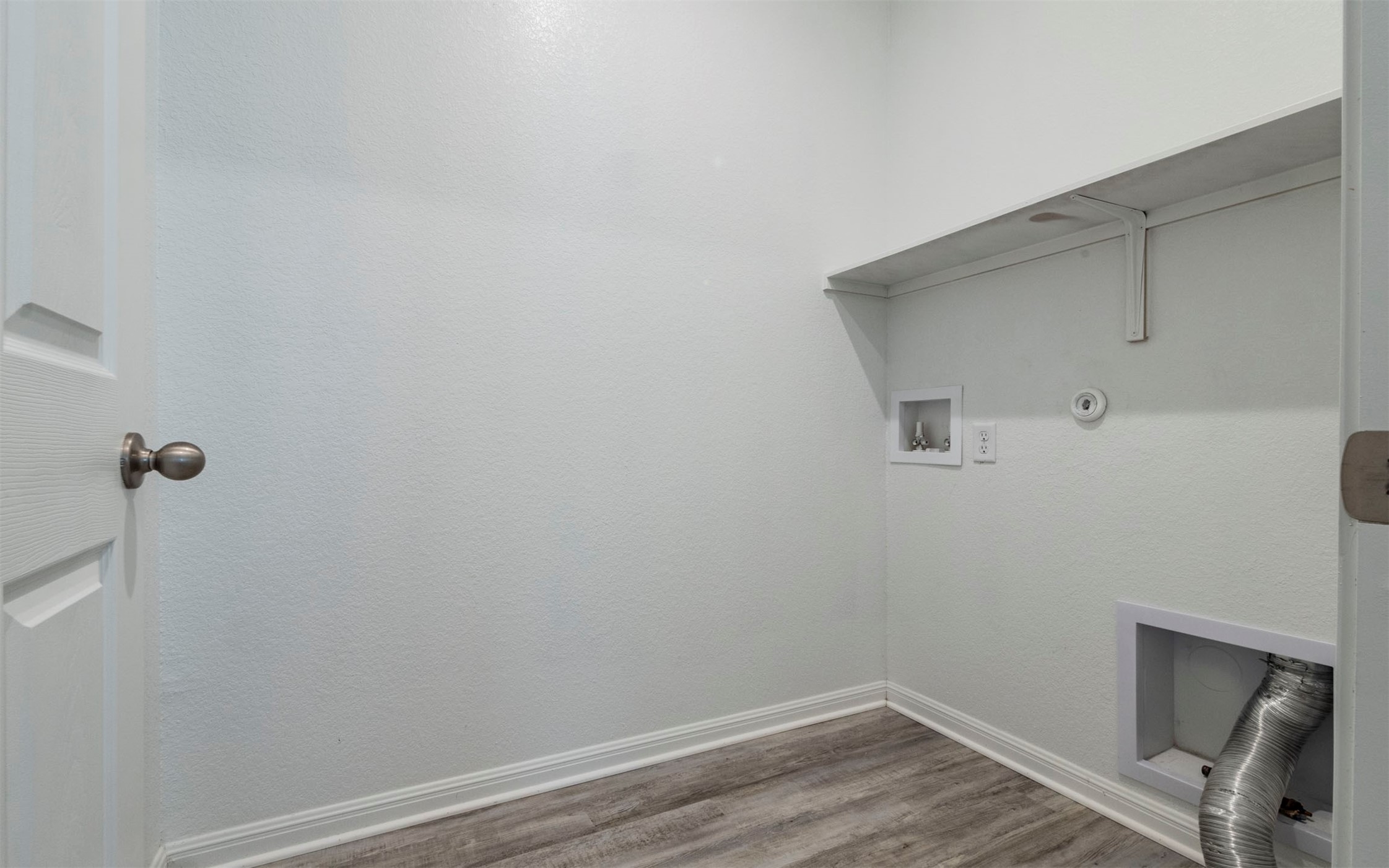 228 Citation Drive Jarrell, TX 76537 - Photo 17 of 30 a view of small space with racks on the wall