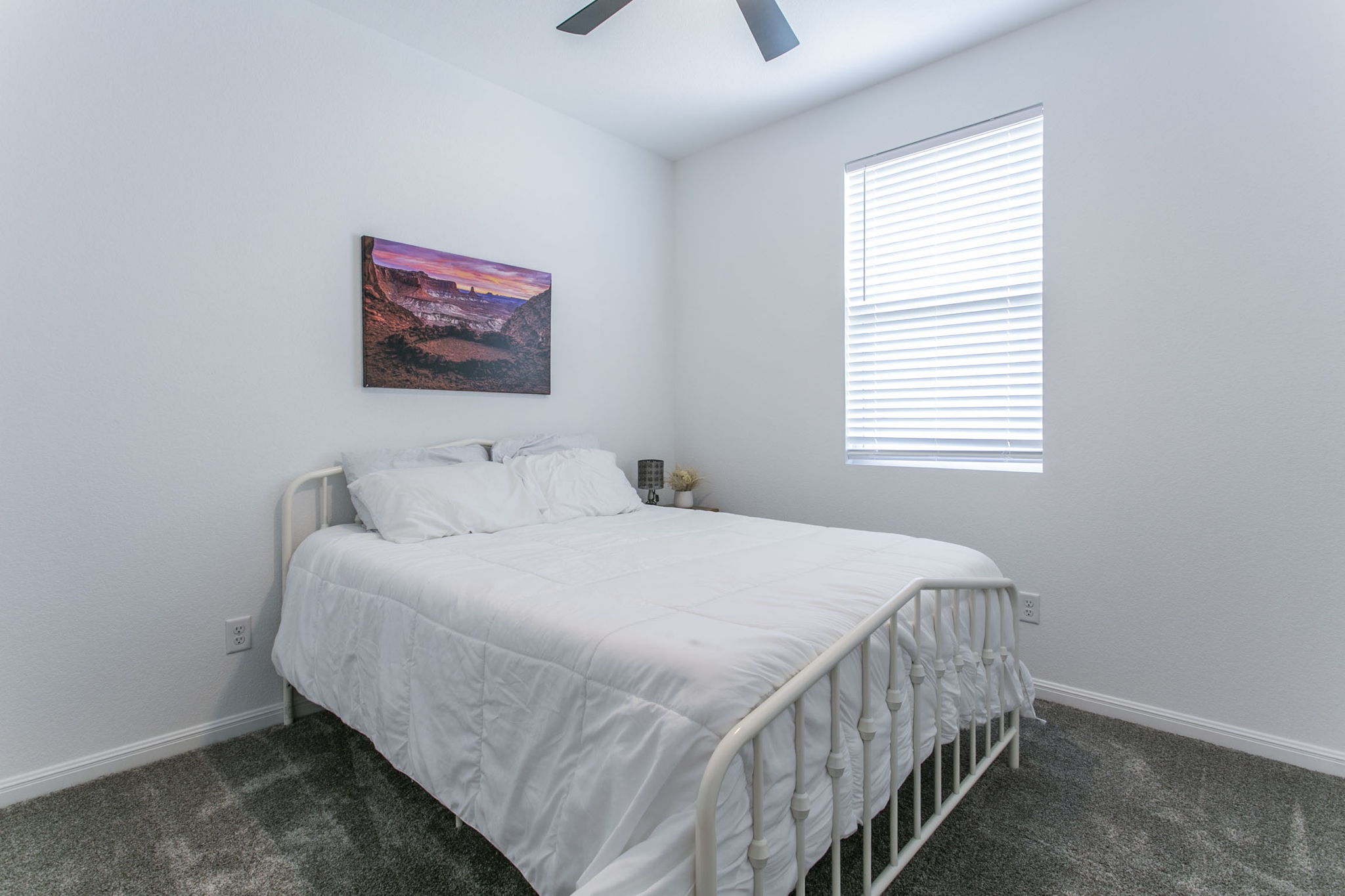 228 Citation Drive Jarrell, TX 76537 - Photo 21 of 30 a bedroom with a bed and a large window