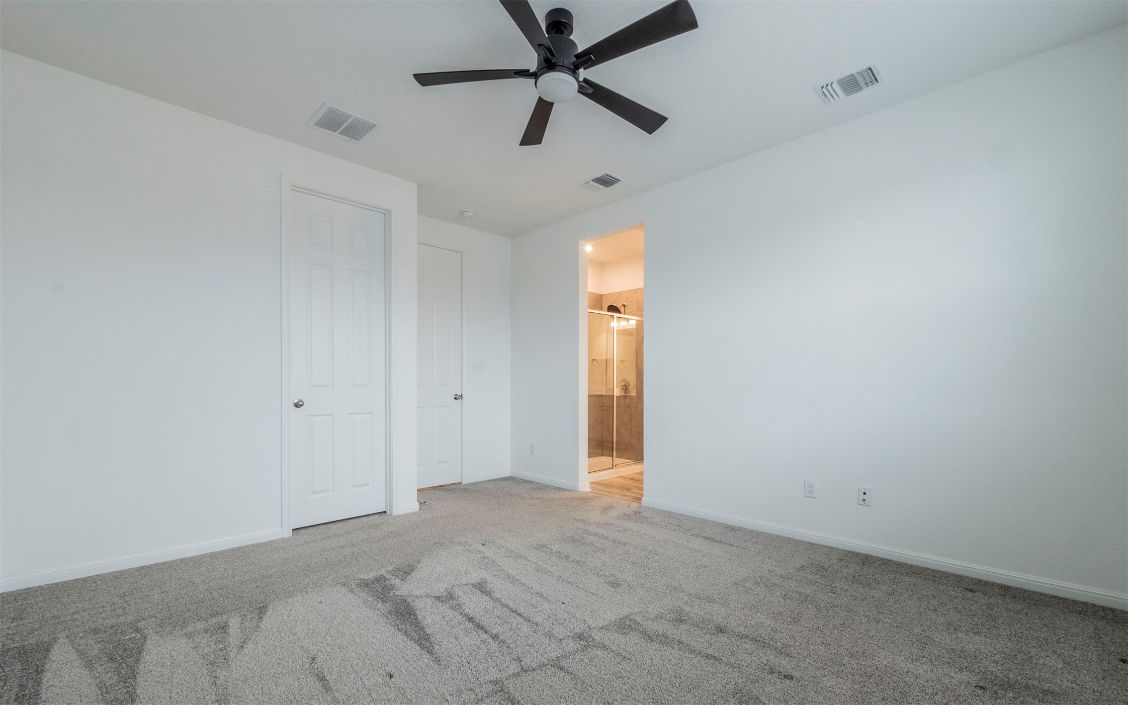 228 Citation Drive Jarrell, TX 76537 - Photo 9 of 30 a view of a livingroom with a ceiling fan and window