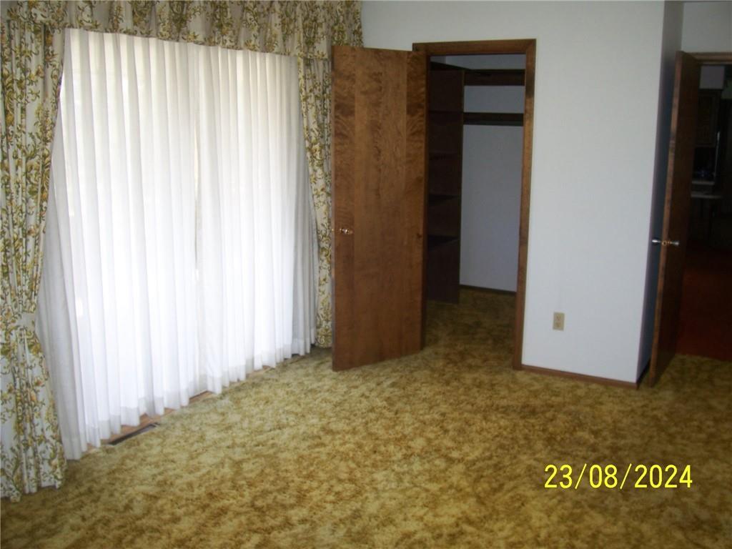 748 Narrows Road Connellsville, PA 15425 - Photo 12 of 32 a view of an empty room with a window