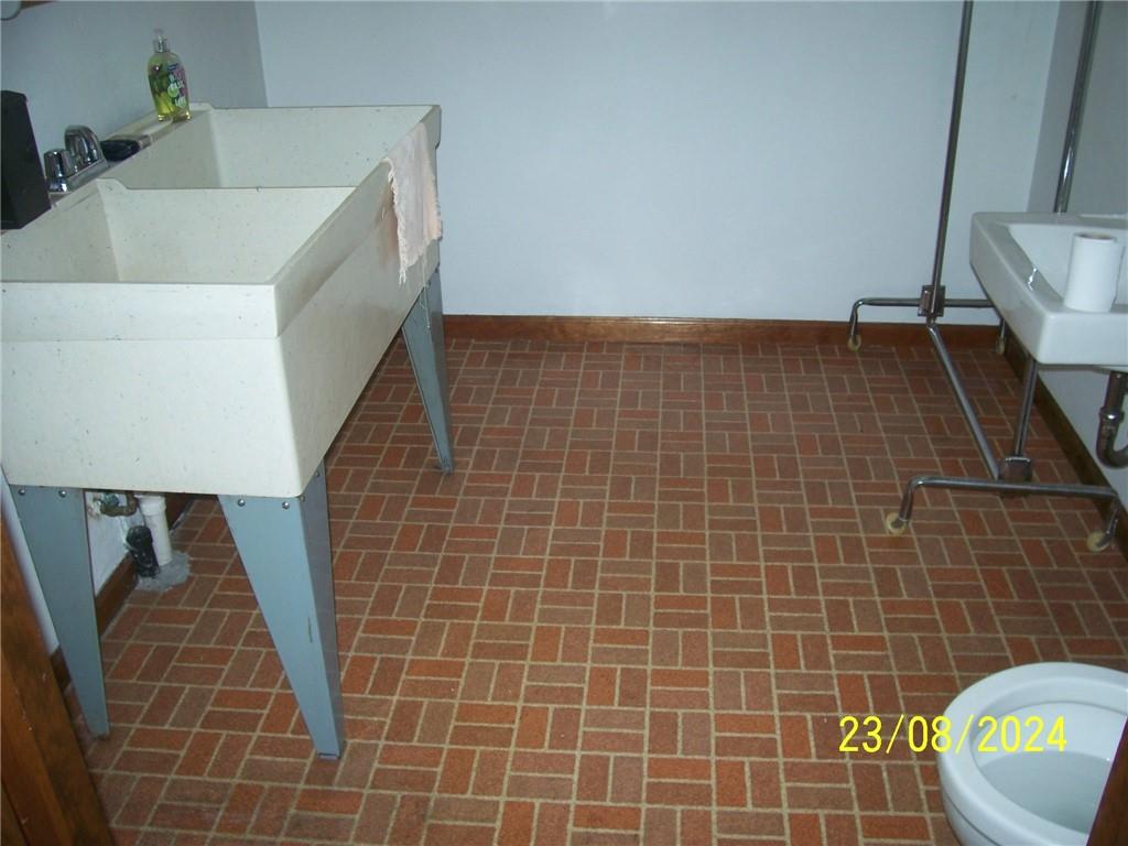 748 Narrows Road Connellsville, PA 15425 - Photo 22 of 32 a bathroom with a sink and toilet