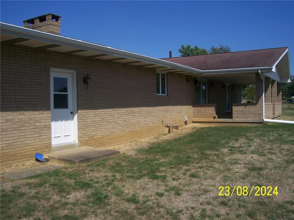 748 Narrows Road Connellsville, PA 15425 - Photo 25 of 32 a front view of a house with garage