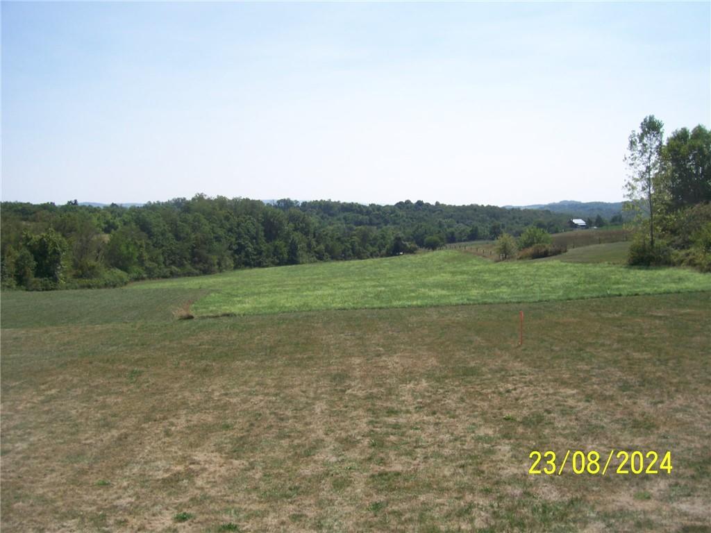 748 Narrows Road Connellsville, PA 15425 - Photo 26 of 32 a view of a field with an trees