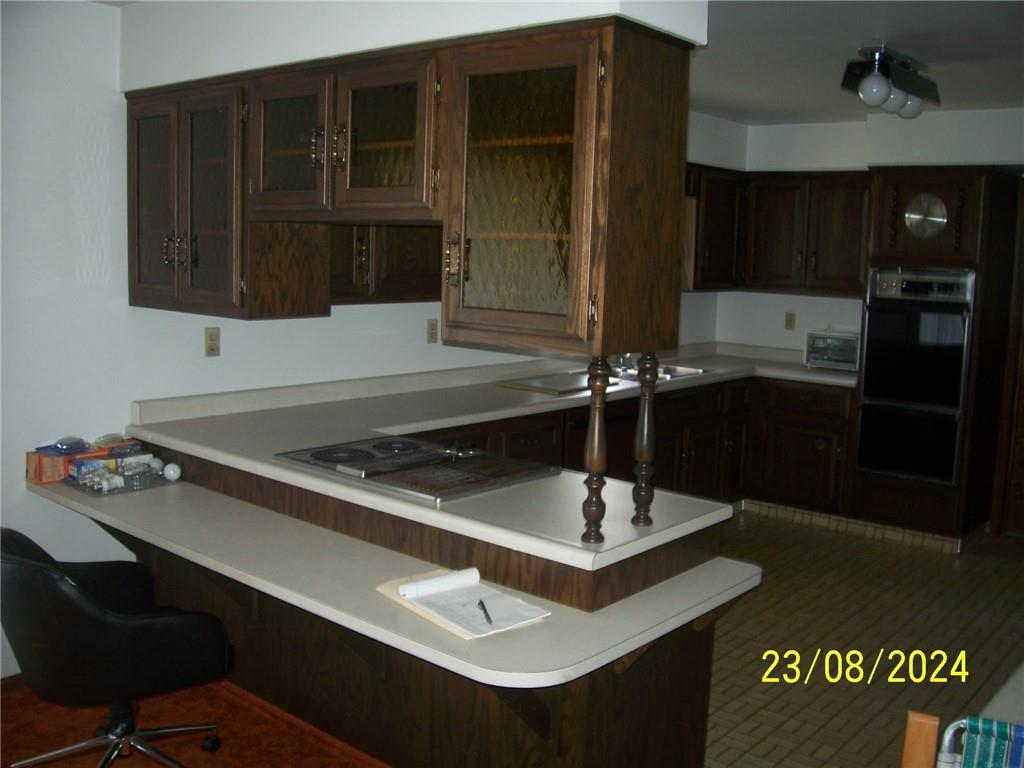 748 Narrows Road Connellsville, PA 15425 - Photo 30 of 32 a kitchen with a sink cabinets and window
