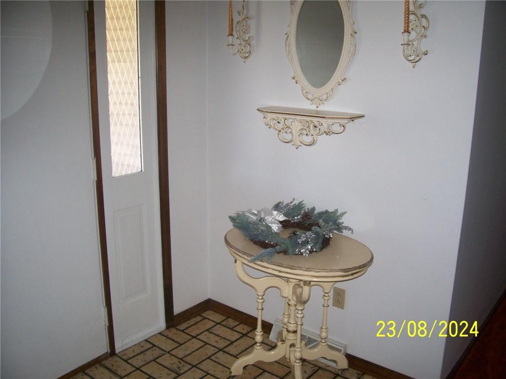 748 Narrows Road Connellsville, PA 15425 - Photo 9 of 32 a bathroom with a sink and a mirror