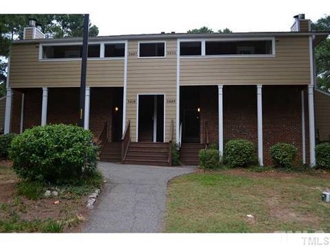 3225 Mill Run, Unit 177 Raleigh, NC 27612 - Photo 1 of 6 a view of a house with backyard and garden