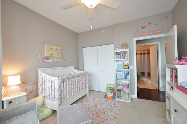 1629 South Prairie Avenue, Unit 809 Chicago, IL 60616 - Photo 14 of 24 a bedroom with furniture a baby crib and a window