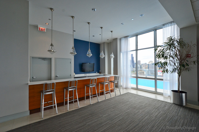 1629 South Prairie Avenue, Unit 809 Chicago, IL 60616 - Photo 20 of 24 a large kitchen with stainless steel appliances a large counter top