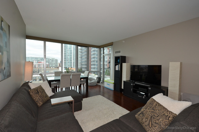 1629 South Prairie Avenue, Unit 809 Chicago, IL 60616 - Photo 3 of 24 a living room with furniture and a flat screen tv