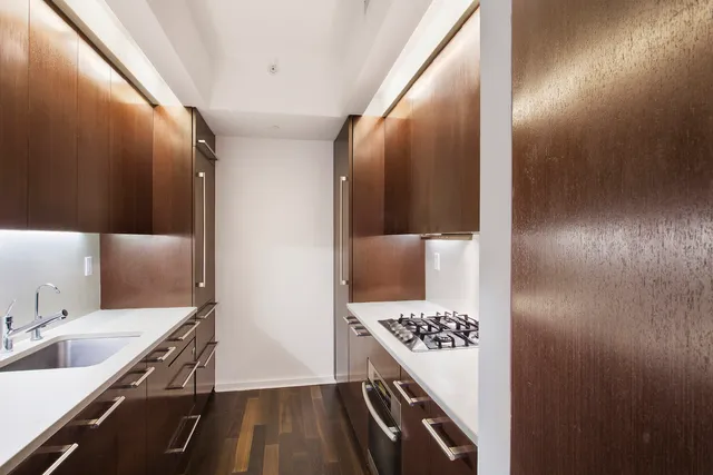 a picture of a room with a table and chairs