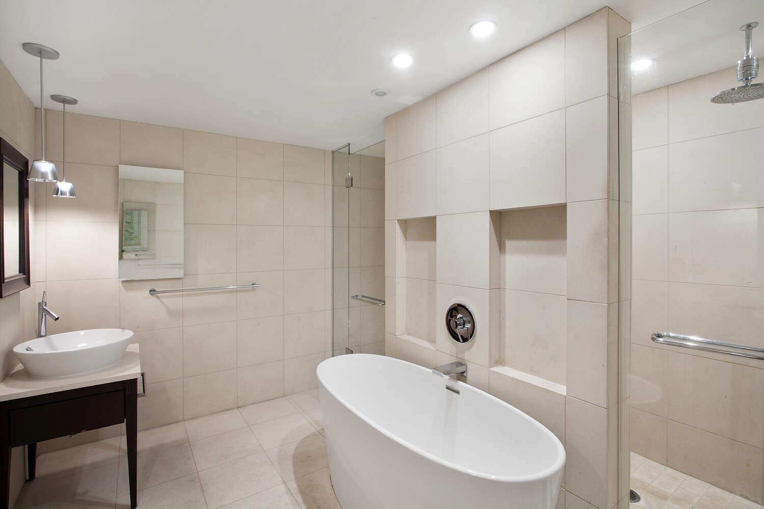 340 East 23rd Street, Unit 6E Manhattan, NY 10010 - Photo 3 of 6 a bathroom with a sink a toilet and shower