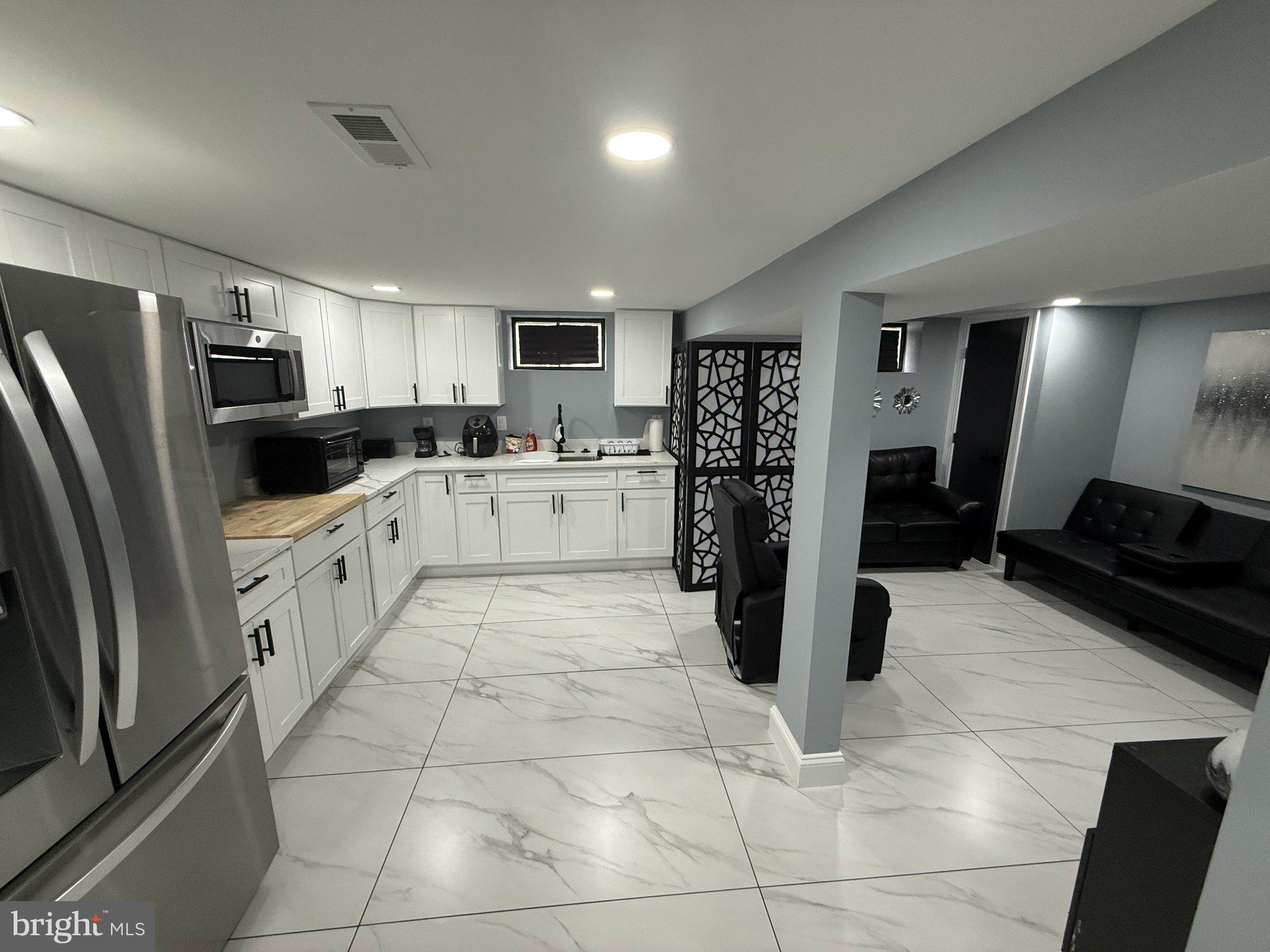 Modern kitchen with sleek finishes.