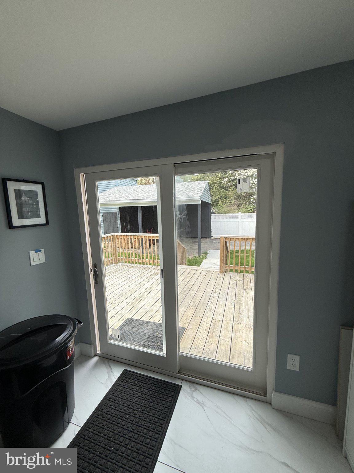7022 Highbridge Road, Unit 2 Bowie, MD 20720 - Photo 11 of 11 Inviting view to a serene backyard.