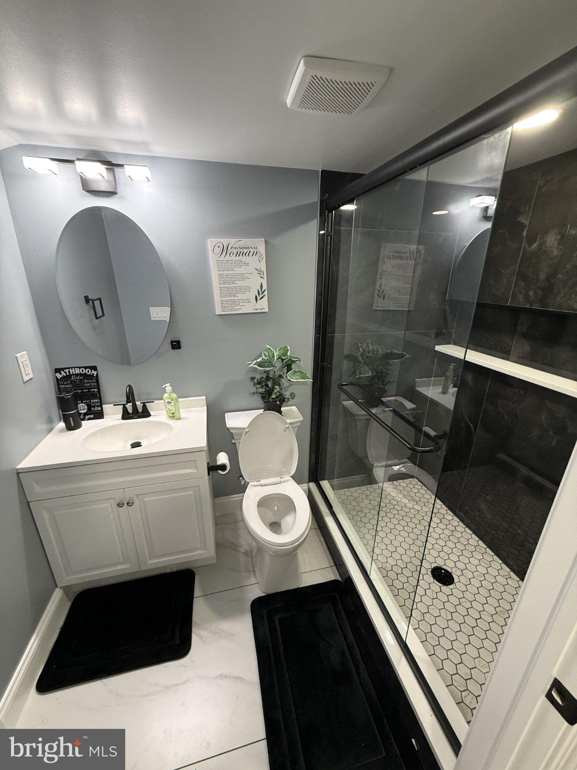 7022 Highbridge Road, Unit 2 Bowie, MD 20720 - Photo 4 of 11 Modern bathroom with sleek design.