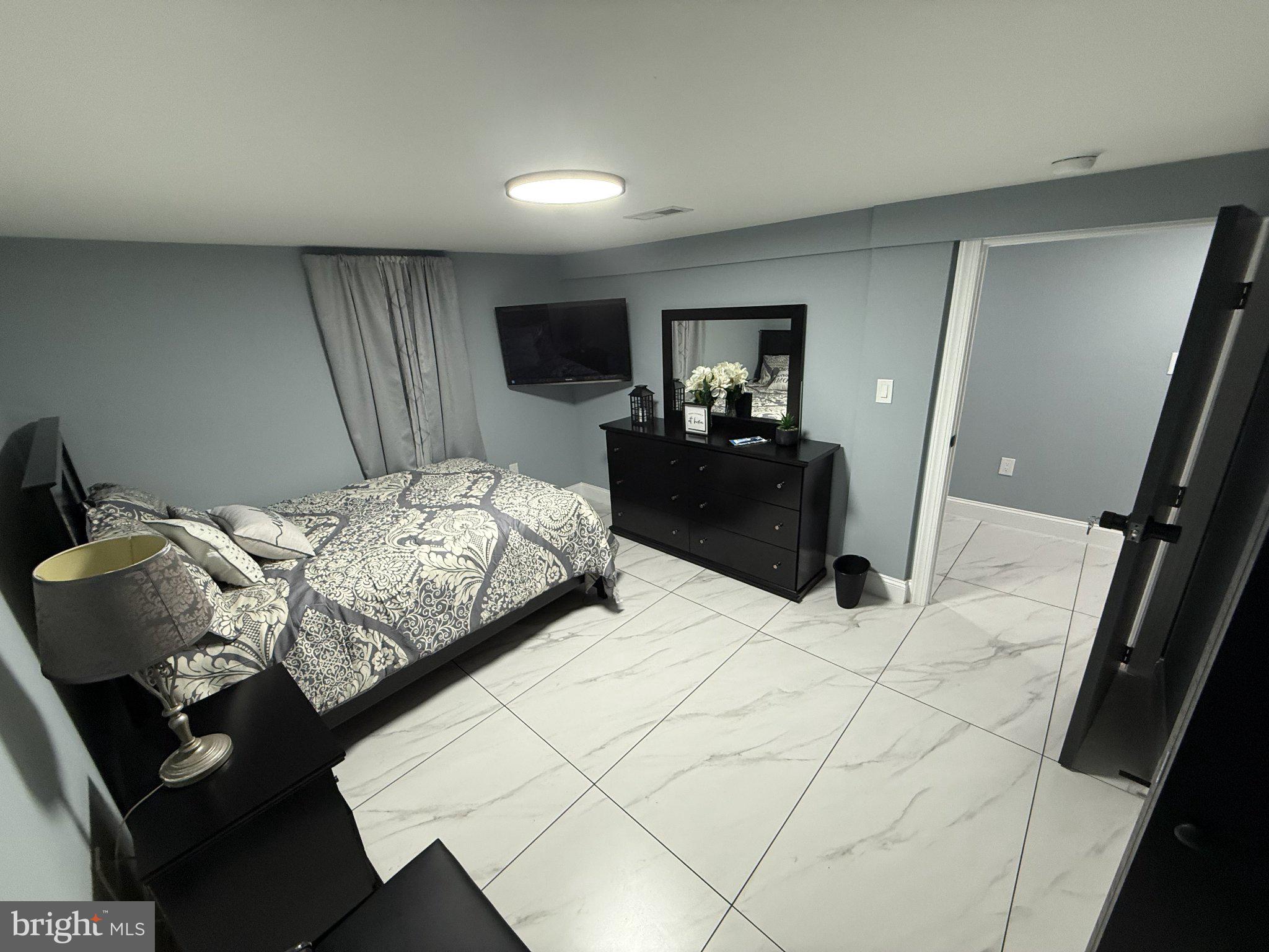 7022 Highbridge Road, Unit 2 Bowie, MD 20720 - Photo 8 of 11 Modern bedroom with sleek design.