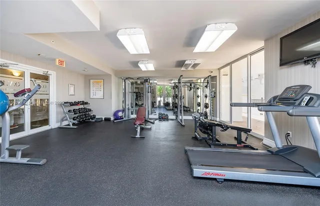 a view of a room with gym equipment