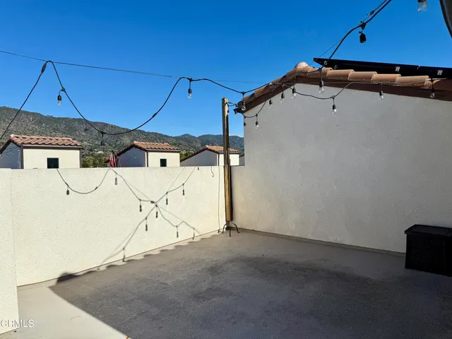 a view of a room with rack on the wall