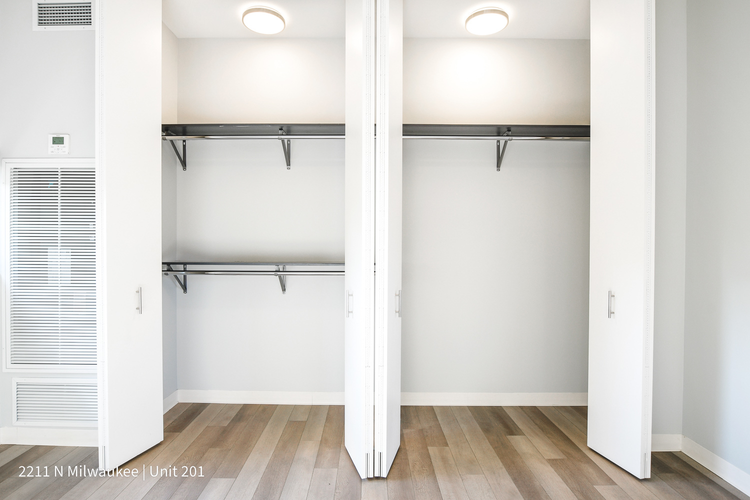 Undisclosed Address Chicago, IL 60647 - Photo 14 of 23 a view of walk in closet with empty racks