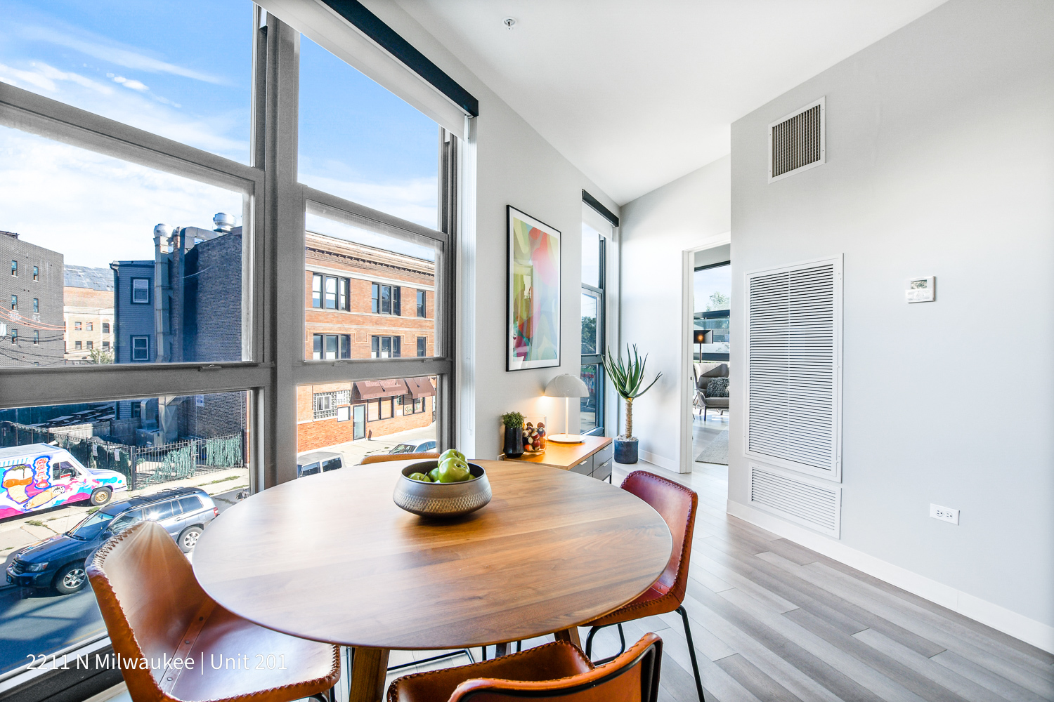 Undisclosed Address Chicago, IL 60647 - Photo 15 of 23 a view of a dining room with furniture window and wooden floor