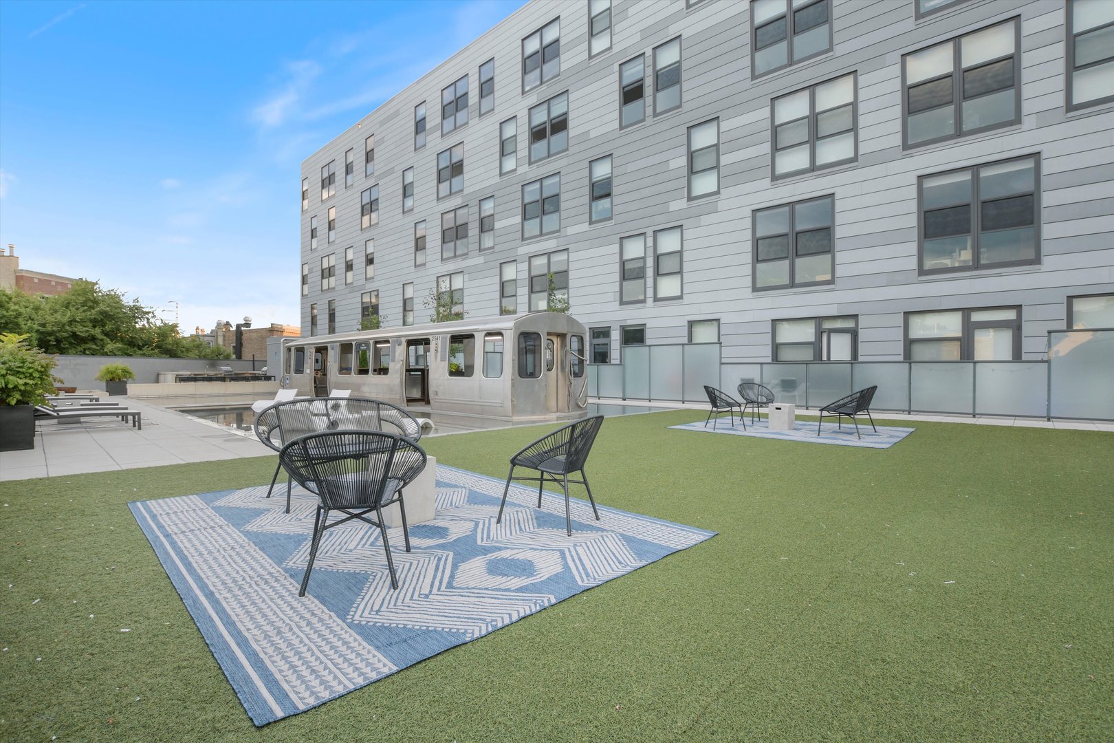 Undisclosed Address Chicago, IL 60647 - Photo 23 of 23 a view of an swimming pool and outdoor seating